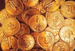 Gold coins stacked together, showcasing investment and precious metal trading.