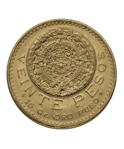Moneda de oro de un peso mexicano con diseño del calendario azteca, primer plano.